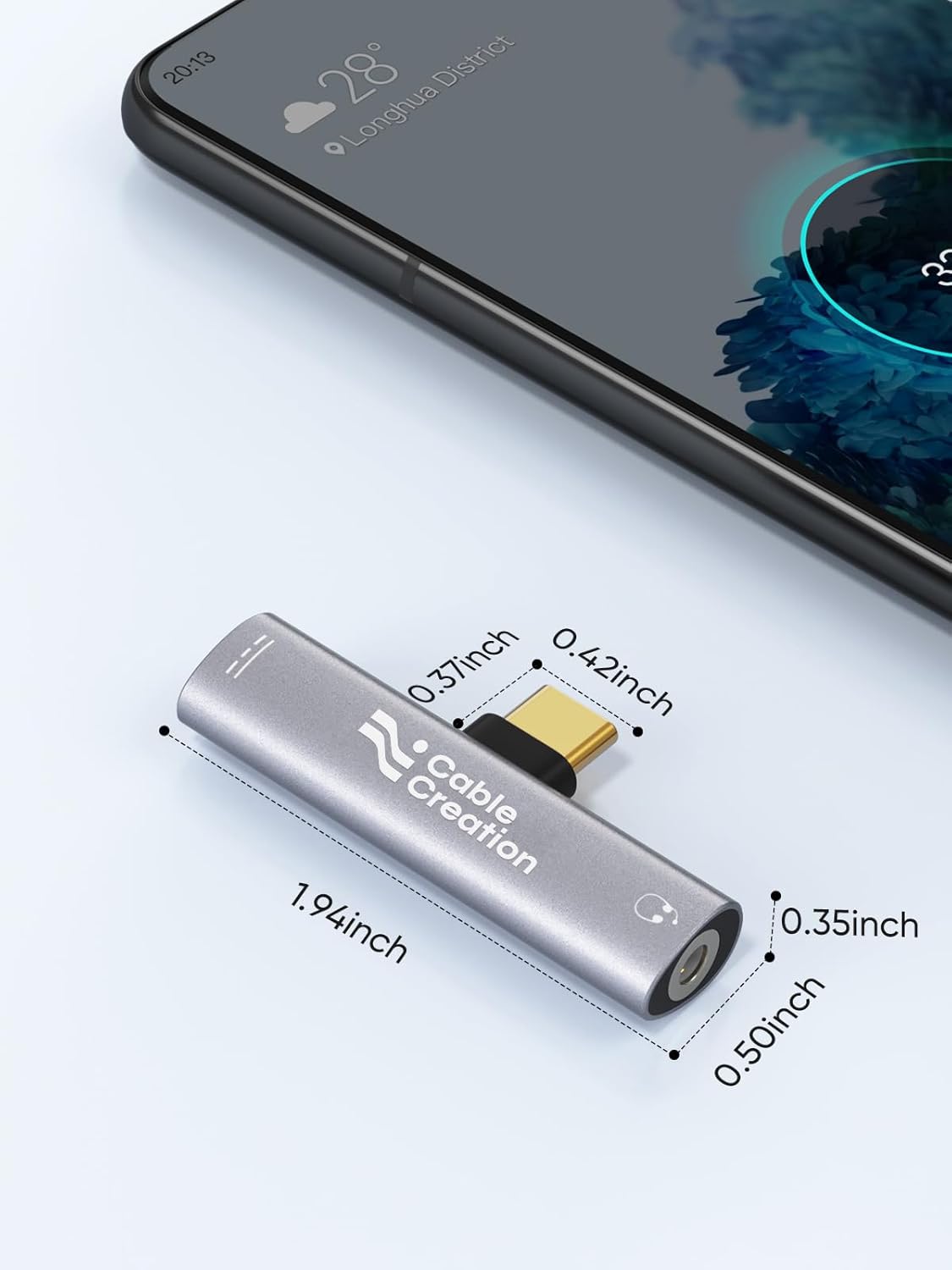 USB-C to 3.5mm Headphone Jack Adapter with dimensions 1.94x0.50x0.42 inch aluminum body shown next to Android smartphone
