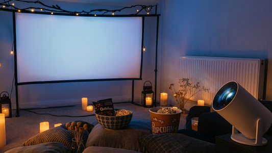 home theater setup with projector screen popcorn and cozy lighting for movie streaming experience