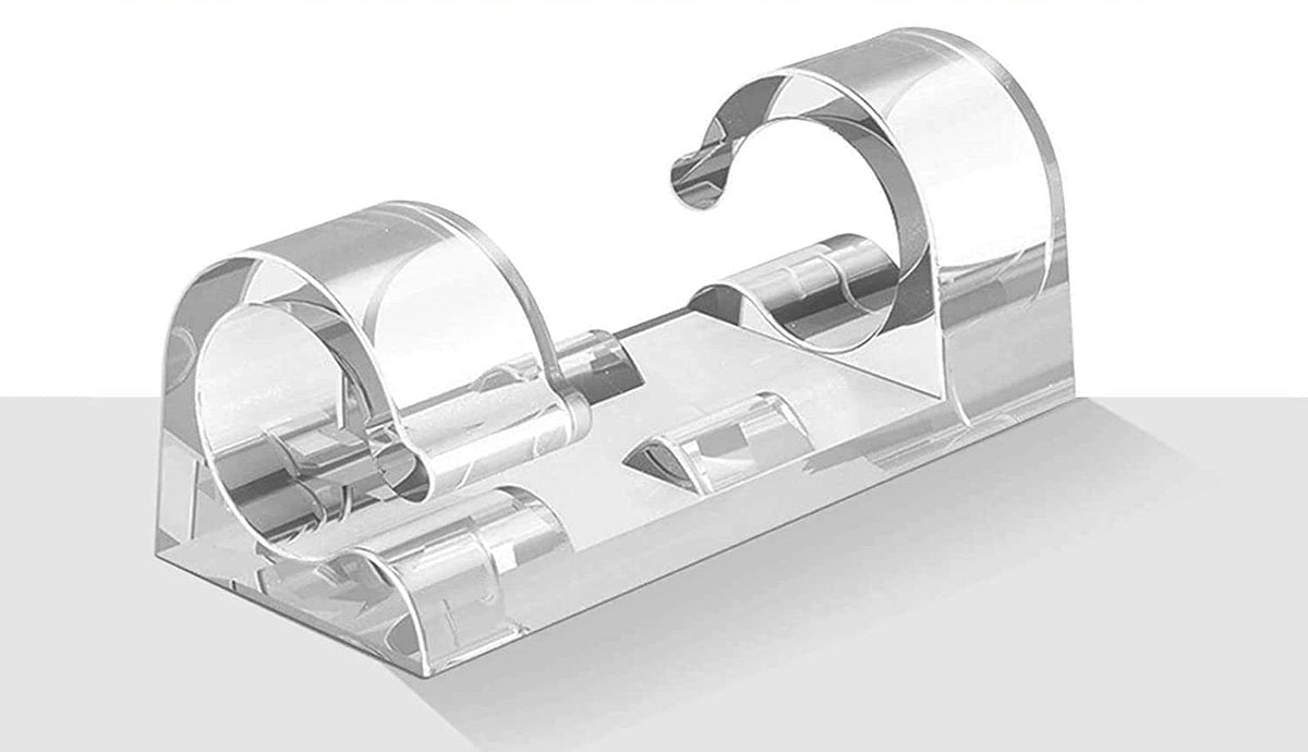 Clear plastic letter holder on a white background