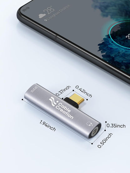 USB-C to 3.5mm Headphone Jack Adapter with dimensions 1.94x0.50x0.42 inch aluminum body shown next to Android smartphone