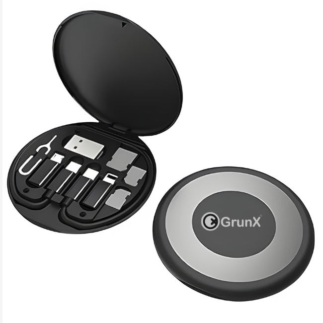 GRUNX Stuff all-in-1 60W fast charging travel set with adapter and multiple cables laid out on travel bag India