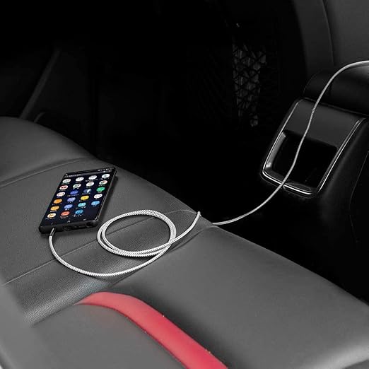 10ft 3.5mm aux cable connecting smartphone on car backseat armrest to front car stereo AUX port