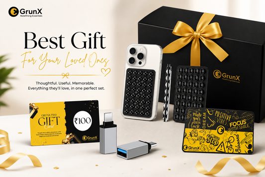 GrunX gift box for loved ones featuring ₹100 gift card, phone case, USB-C adapters, and accessory card in premium black and gold packaging
