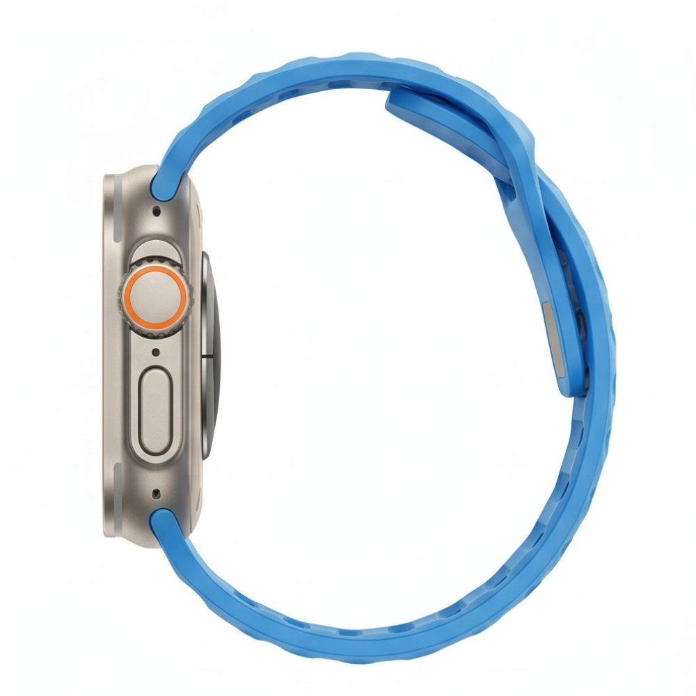 Side profile view of an Apple Watch Ultra with titanium case and bright blue silicone sport band on a white background, showcasing the band's sporty buckle design