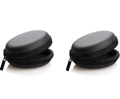 Two black round zippered cases on a white background