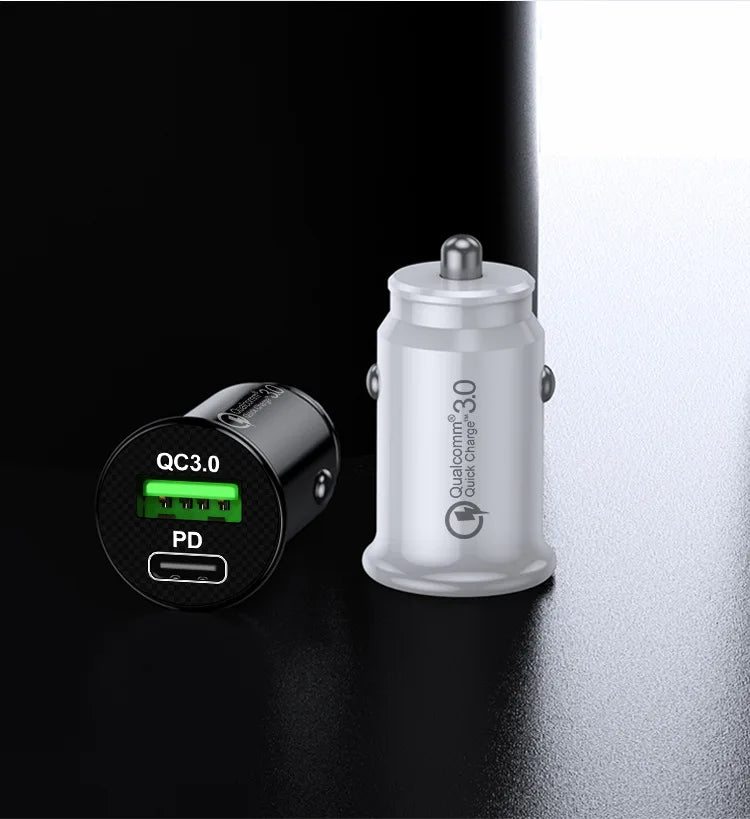 Two car chargers, one black and one white, on a reflective surface with a dark background.