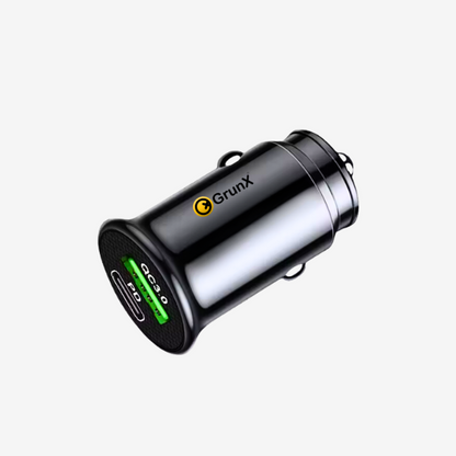 Car charger with dual output ports on a green and white background
