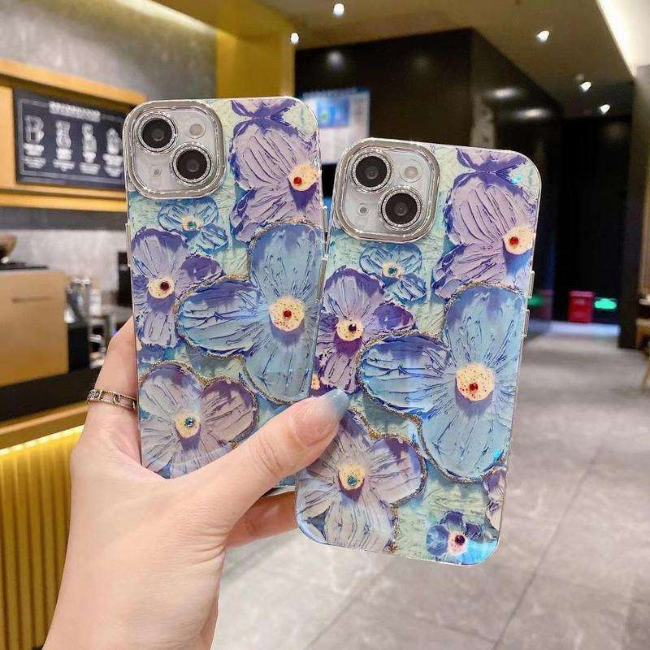 GRUNX Eliza Diamond Blue Flower iPhone case iPhone 15 woman showcasing back view retro oil painting design India