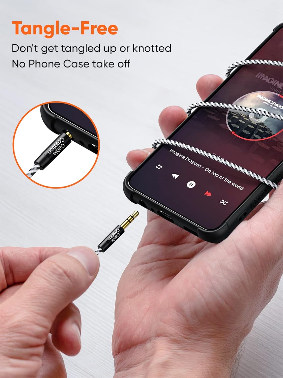 3.5mm aux extension cable tangle-free braided design with slim gold-plated connector fitting smartphone with phone case on