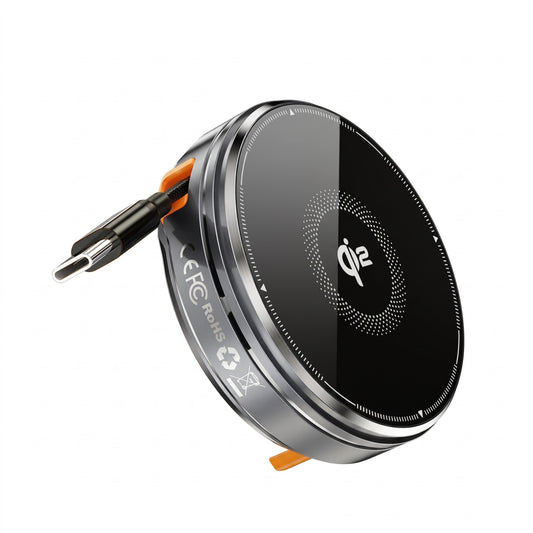A wireless charging pad with a circular black and silver design, featuring a Qi2 logo in the center and an orange accent tab, shown on a white background.