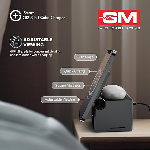 A Qi2 3-in-1 cube charger shown in a bedroom setting on a bedside table, charging a smartphone and holding a white earbud. The image includes feature callouts such as adjustable viewing, 60-degree angle, quick charge, strong magnets, and adjustable viewing, along with the iSmart and GM logos.