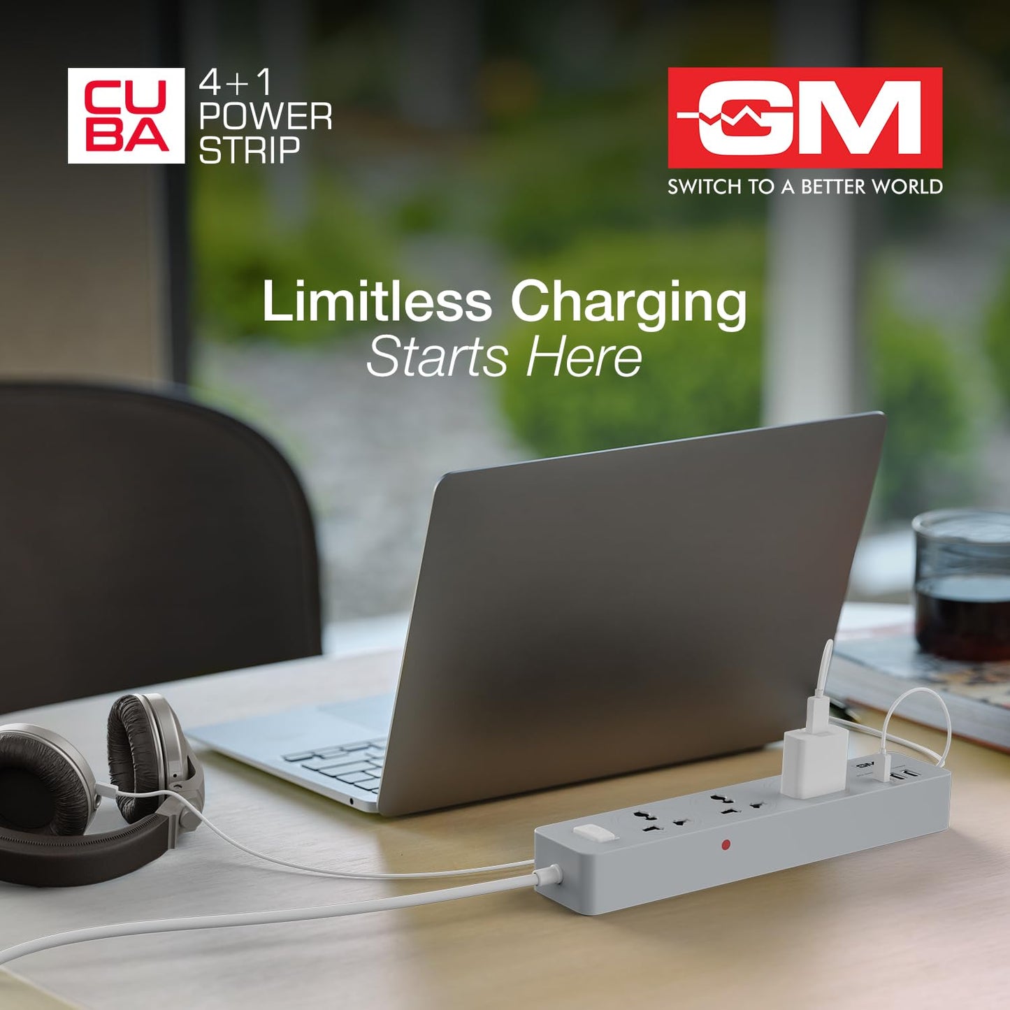 GM Cuba 4+1 power strip on office desk charging laptop headphones and phone with USB and universal sockets