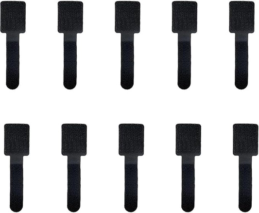 Black velcro straps on a white background
