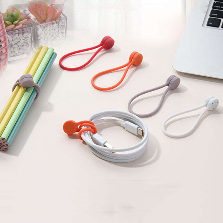 GRUNX Loki silicone cable ties displaying magnetic attachment to metal desk surface with organized cords India