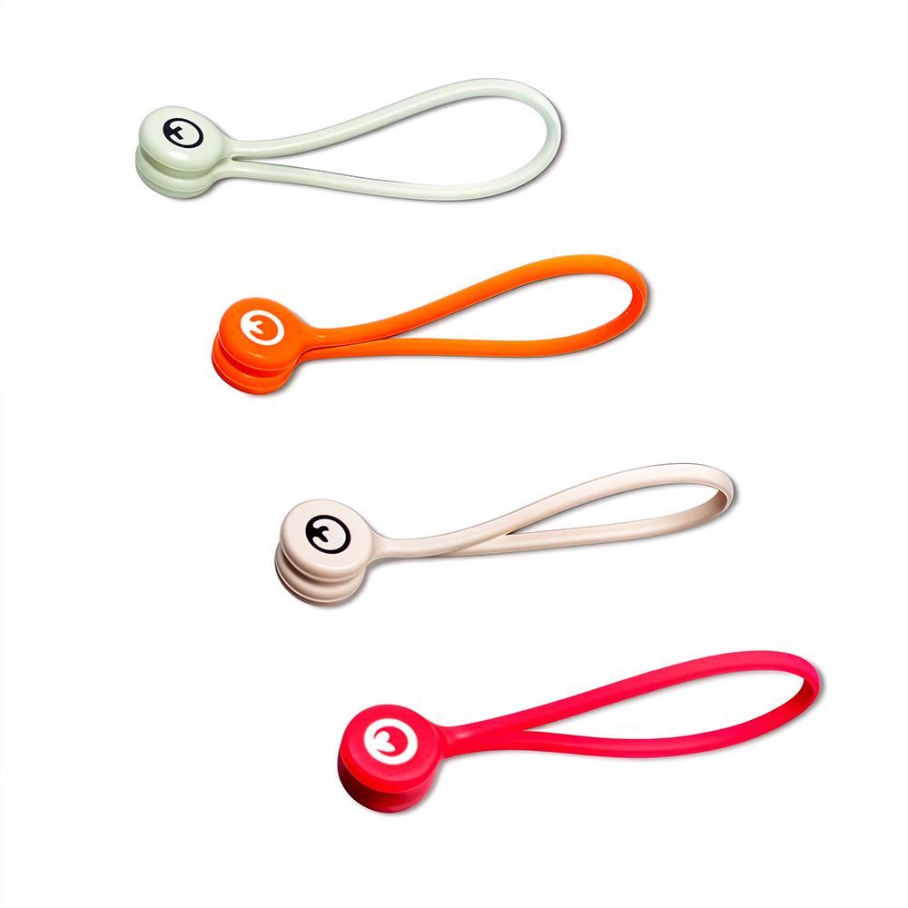 GRUNX Loki silicone cable ties displaying magnetic attachment to metal desk surface with organized cords India