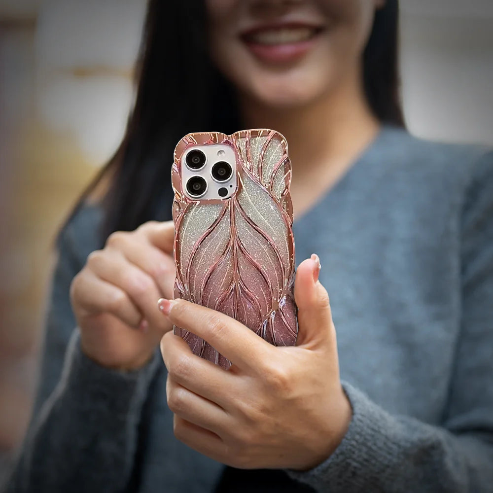 GRUNX Lucy pink glitter iPhone case held by Indian woman showcasing shimmer finish back view