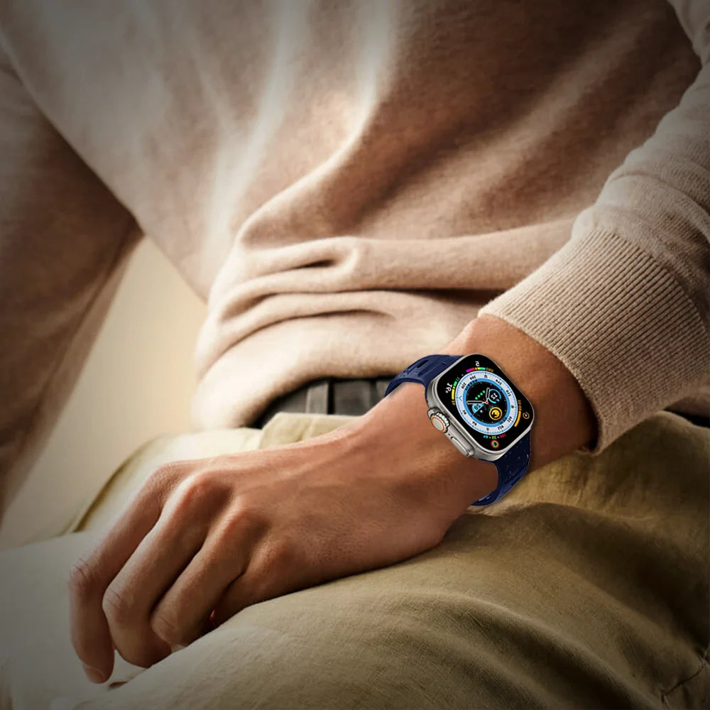 GRUNX Mars dark blue magnetic silicone Apple Watch strap on wrist showing secure magnetic closure Indian lifestyle