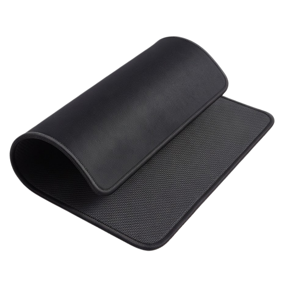 A black gaming mouse pad with a textured surface, shown partially rolled on a plain white background.
