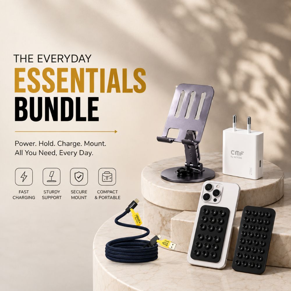 A promotional bundle display for a phone accessories set on beige stone pedestals. The bundle includes a black phone stand, a white wall charger with the CMF logo, a black textured grip case, a white textured grip case, and a black cable with a yellow connector.