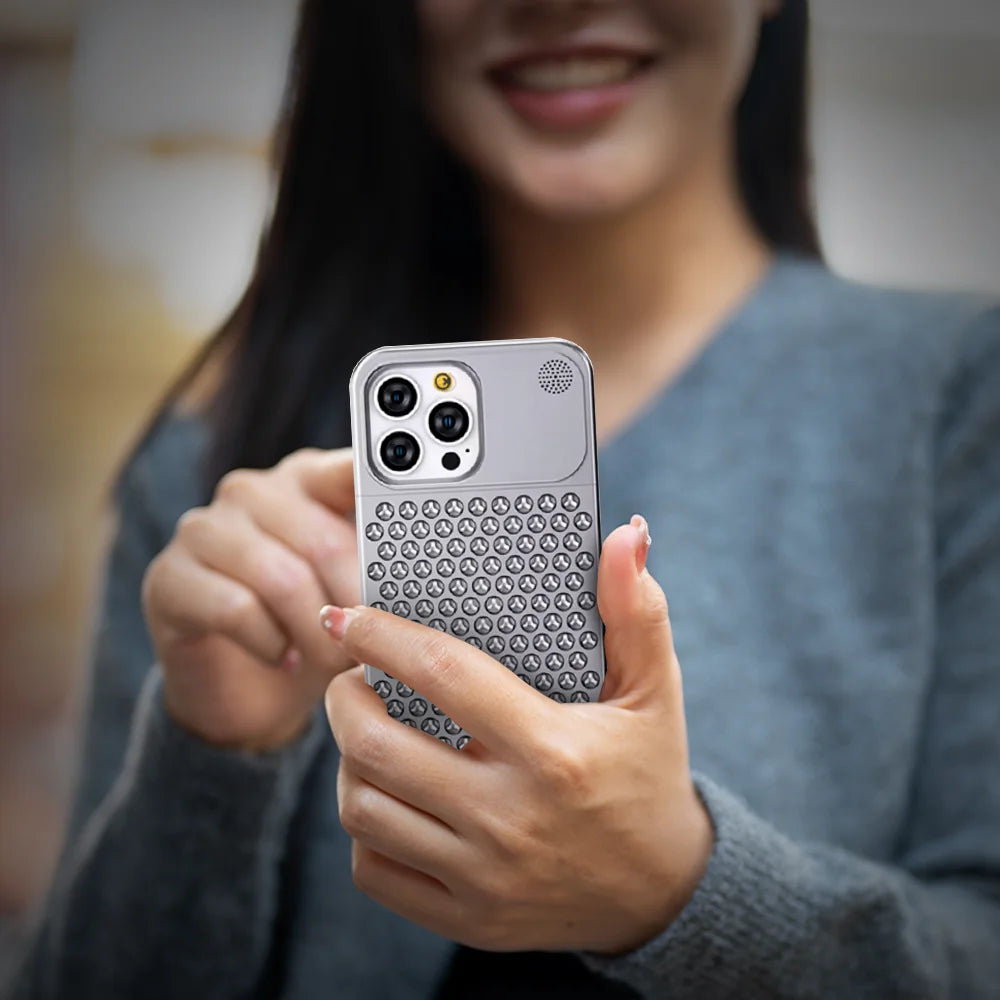 Woman presenting GRUNX Tesla silver aluminum rimless iPhone 15 case luxury fragrance premium feel India
