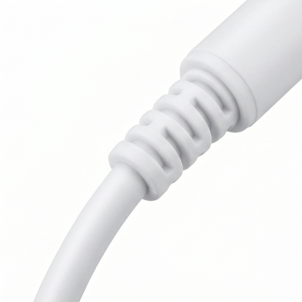 White USB-C to 3.5mm audio adapter cable on white background