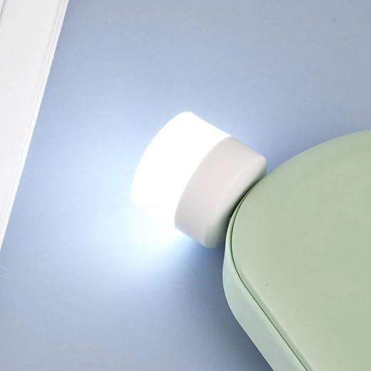 GRUNX USB mini night light plugged into power bank glowing bright white LED portable India