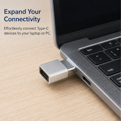 USB-C to USB 3.0 OTG Adapter plugged into laptop USB port for expanded device connectivity