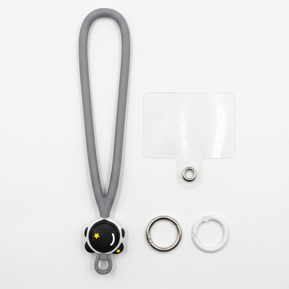 Grey silicone phone lanyard set with wrist strap, keyring, and adhesive connector pad