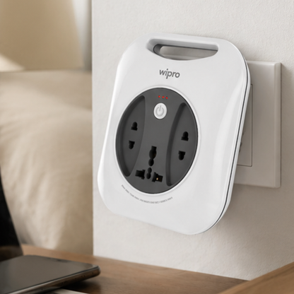 Wipro Flex Box 4-socket universal extension board plugged into wall socket with power button and overload indicator
