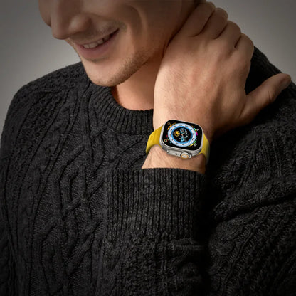 GRUNX Yahoo yellow silicone Apple Watch Ultra strap magnetic closure snap-on buckle close-up detail