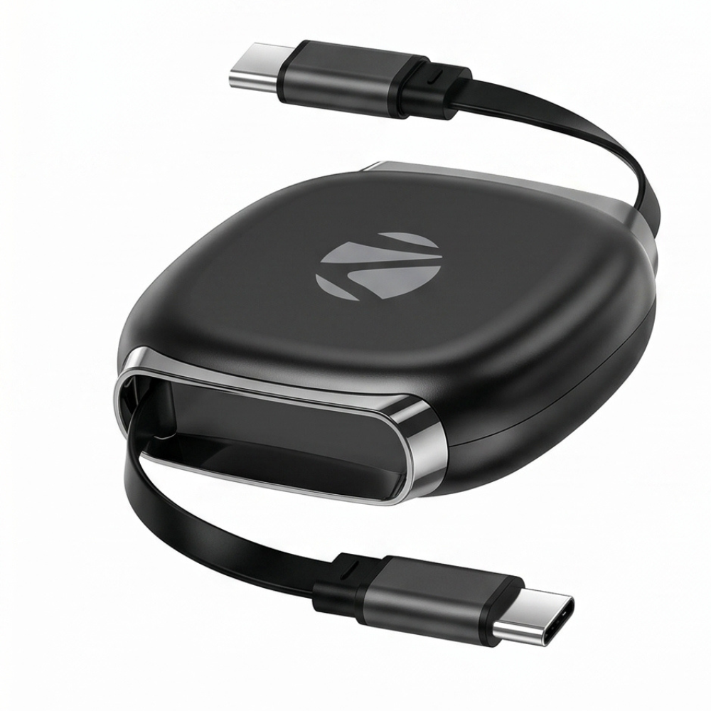 Black portable USB-C cable organizer with retractable cord and chrome accents, displaying compact cable storage solution