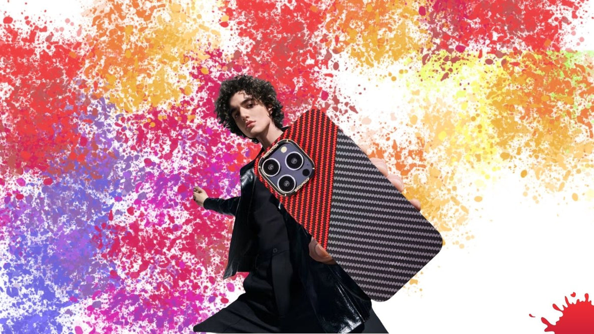 Generation Z boy holding a carbon fiber trending iphone case as GrunX sales cases which matches watch strap as combo for men and boys in India for all iphone models.